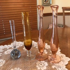FOUR ANTIQUE BUD VASES